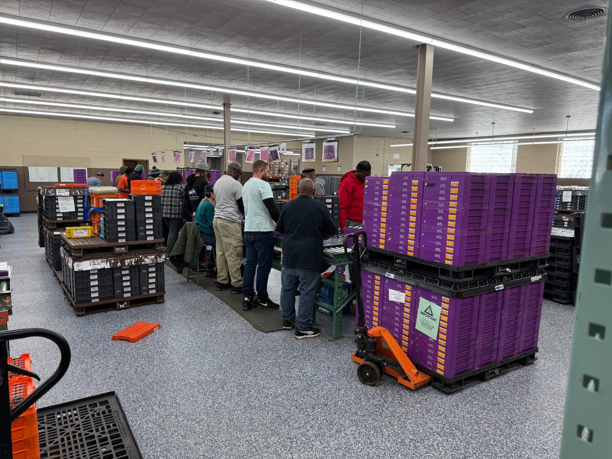 Jay Shop participants engaged in precision kitting work